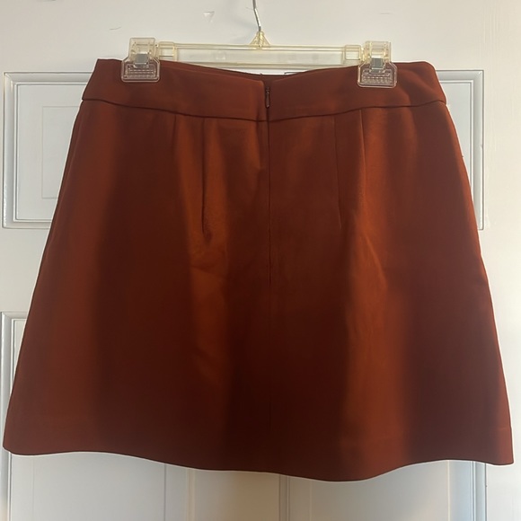 Burnt orange mini skirt with copper button details. Express size 10 - Picture 2 of 3